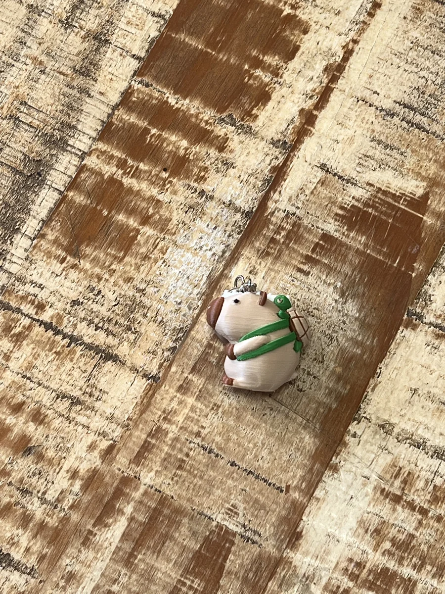 Chaveiro capivara com tartaruga produzido em impressão 3D