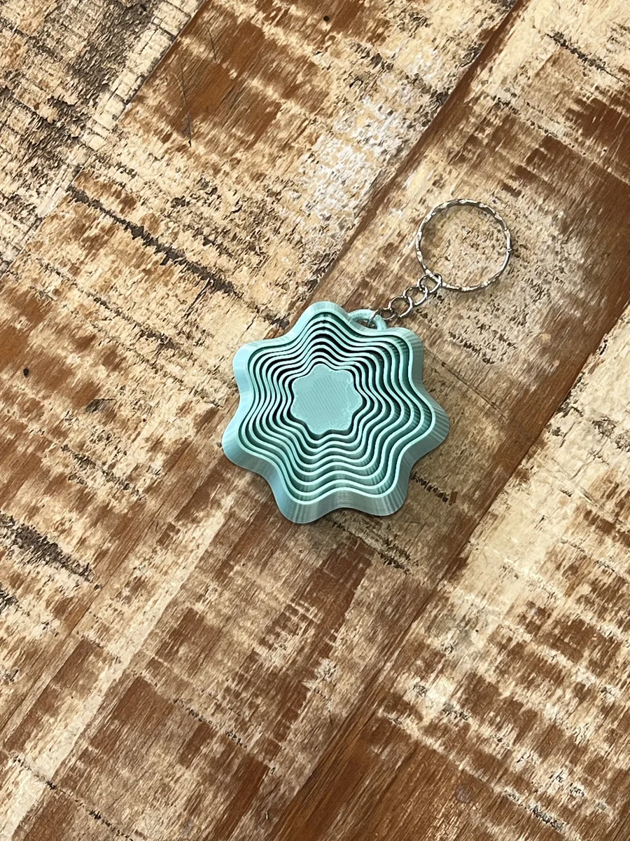 Chaveiro estrela fidget produzido em impressão 3D